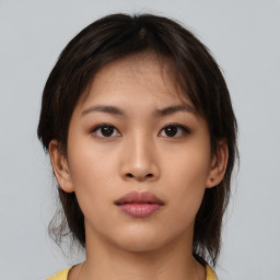 Neutral asian young-adult female with medium  brown hair and brown eyes