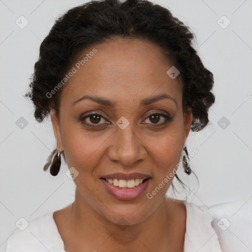 Joyful black adult female with short  brown hair and brown eyes