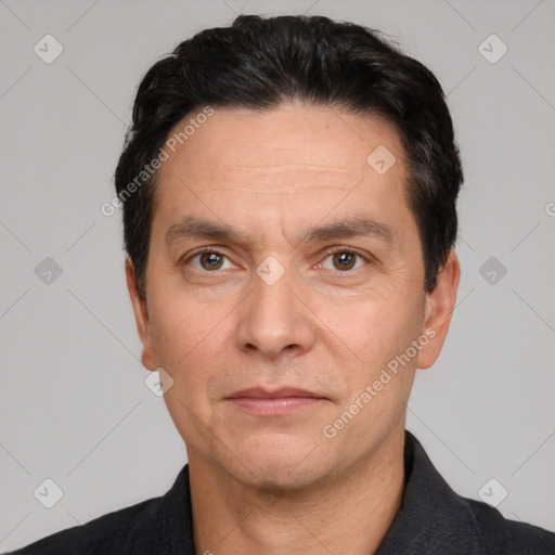 Neutral white adult male with short  black hair and brown eyes