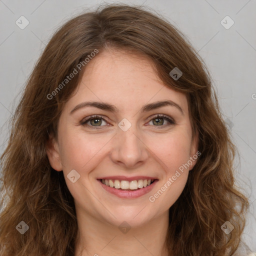 Joyful white young-adult female with long  brown hair and green eyes