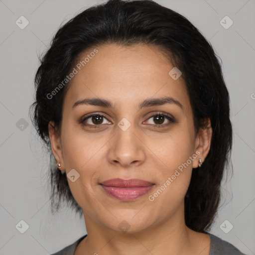 Joyful latino young-adult female with medium  brown hair and brown eyes