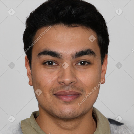 Joyful latino young-adult male with short  black hair and brown eyes