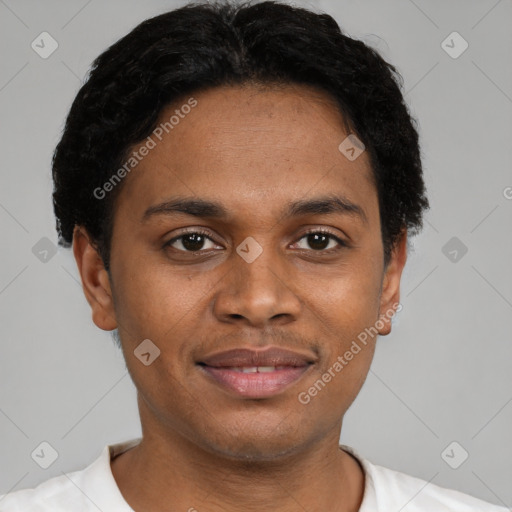Joyful black young-adult male with short  black hair and brown eyes