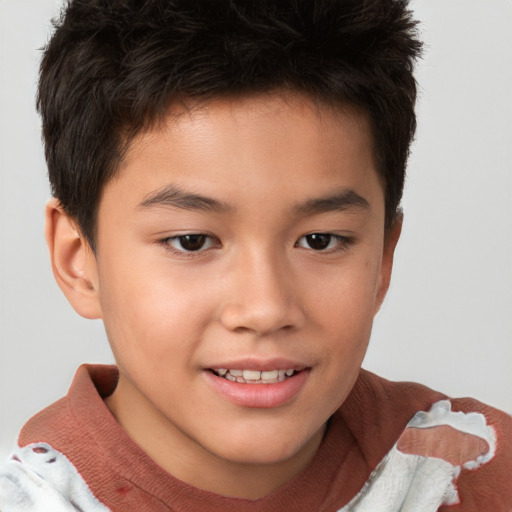 Joyful white child male with short  brown hair and brown eyes