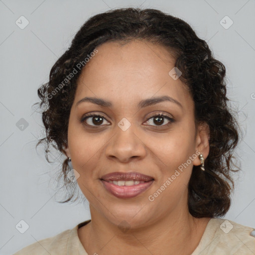 Joyful black young-adult female with medium  brown hair and brown eyes