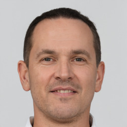 Neutral white adult male with short  brown hair and brown eyes