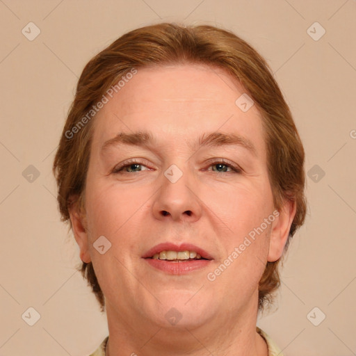 Joyful white adult female with medium  brown hair and blue eyes