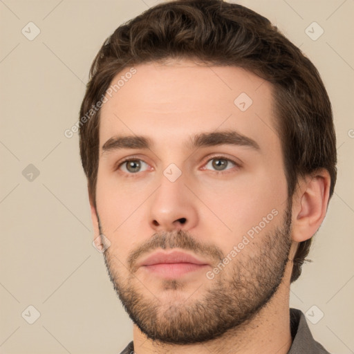 Neutral white young-adult male with short  brown hair and brown eyes