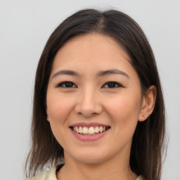 Joyful asian young-adult female with medium  brown hair and brown eyes