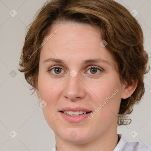 Joyful white adult female with medium  brown hair and green eyes