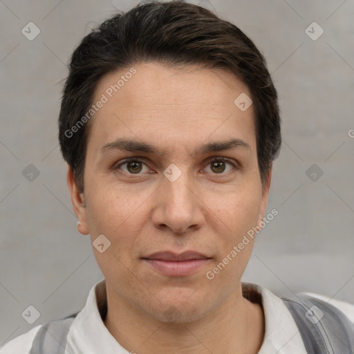 Joyful white adult male with short  brown hair and grey eyes