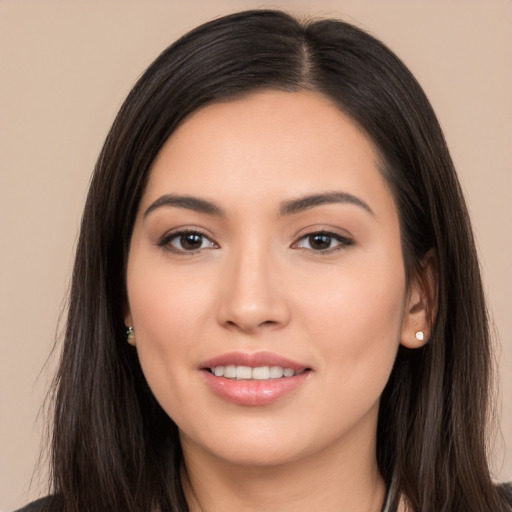 Joyful white young-adult female with long  black hair and brown eyes