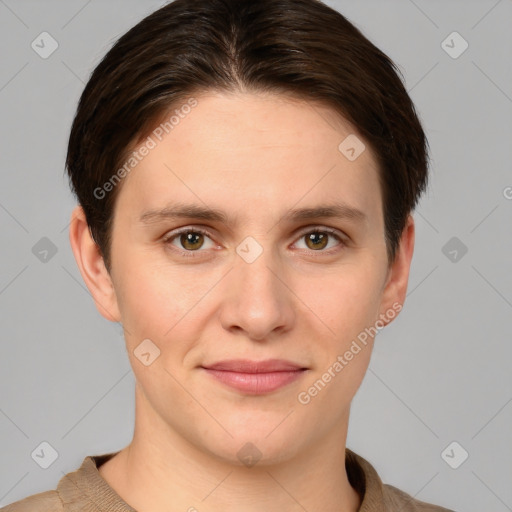 Joyful white young-adult female with short  brown hair and grey eyes