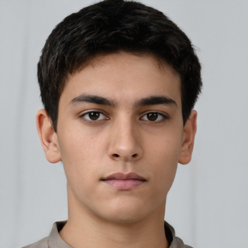 Neutral asian young-adult male with short  brown hair and brown eyes