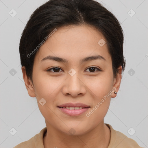 Joyful asian young-adult female with short  brown hair and brown eyes