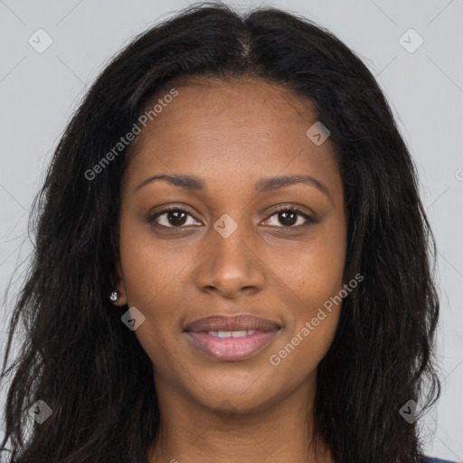 Joyful black young-adult female with long  brown hair and brown eyes