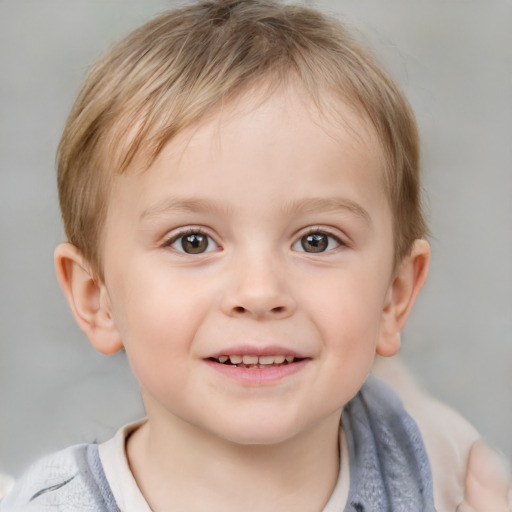 Joyful white child male with short  brown hair and blue eyes