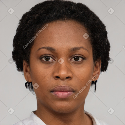 Neutral black young-adult female with short  brown hair and brown eyes