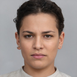 Neutral white young-adult female with short  brown hair and brown eyes