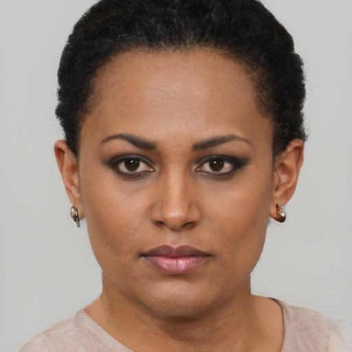 Neutral black young-adult female with short  brown hair and brown eyes