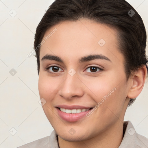 Joyful white young-adult female with medium  brown hair and brown eyes