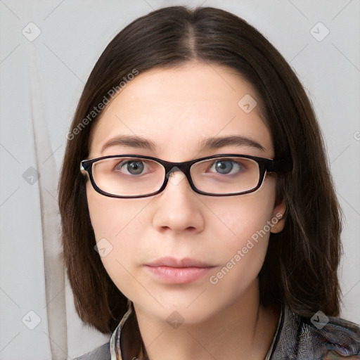 Neutral white young-adult female with medium  brown hair and brown eyes