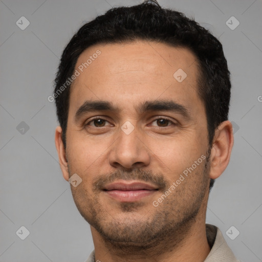 Joyful latino young-adult male with short  black hair and brown eyes