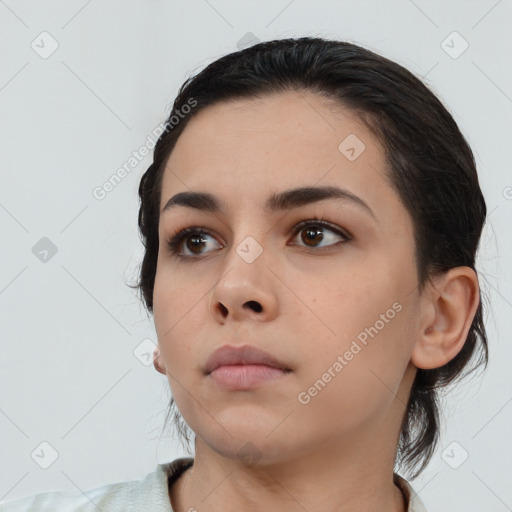 Neutral white young-adult female with medium  brown hair and brown eyes