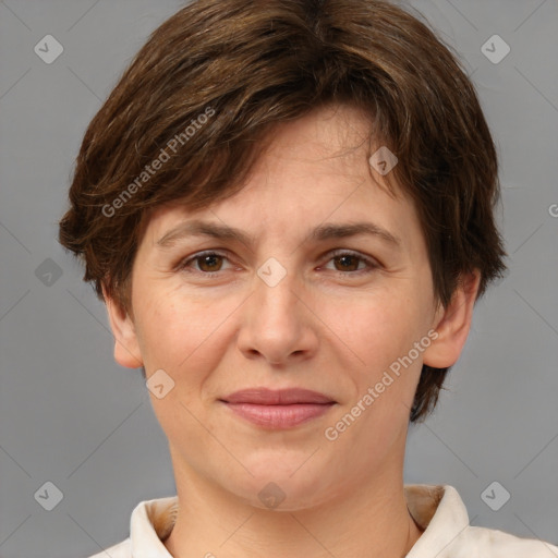 Joyful white adult female with medium  brown hair and brown eyes