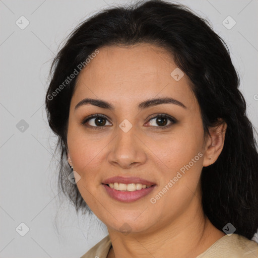 Joyful latino young-adult female with long  brown hair and brown eyes