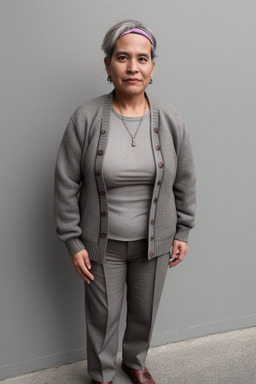 Peruvian middle-aged non-binary with  gray hair