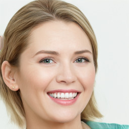 Joyful white young-adult female with medium  brown hair and blue eyes