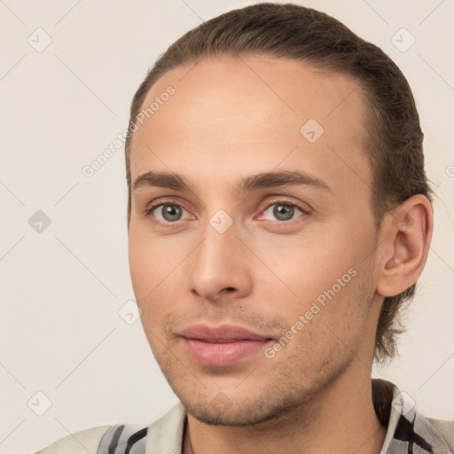 Neutral white young-adult male with short  brown hair and brown eyes