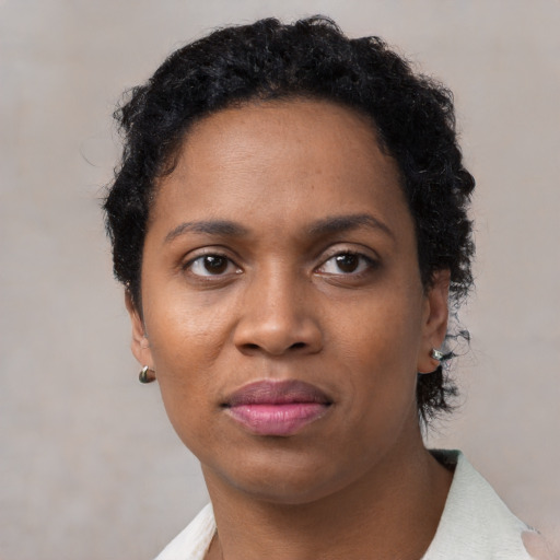 Neutral black young-adult female with short  brown hair and brown eyes