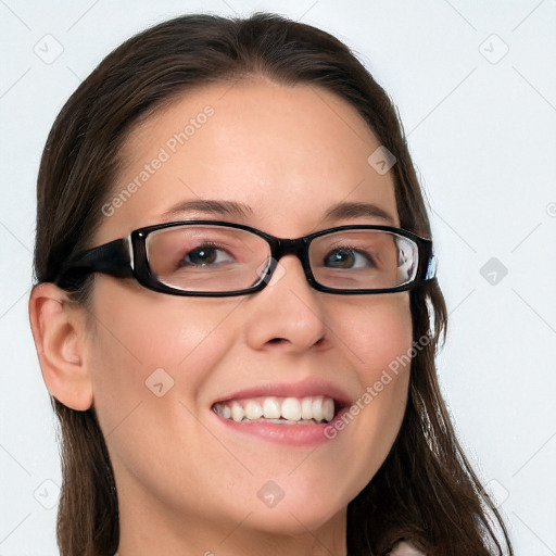 Joyful white young-adult female with long  brown hair and blue eyes