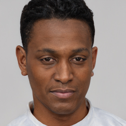 Neutral black young-adult male with short  black hair and brown eyes