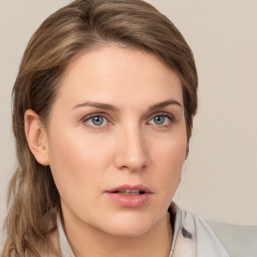 Neutral white young-adult female with medium  brown hair and grey eyes