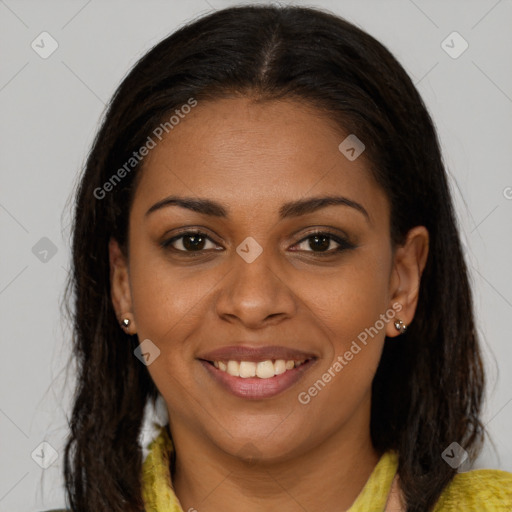 Joyful black young-adult female with long  brown hair and brown eyes