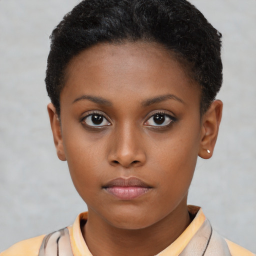 Neutral black young-adult female with short  brown hair and brown eyes