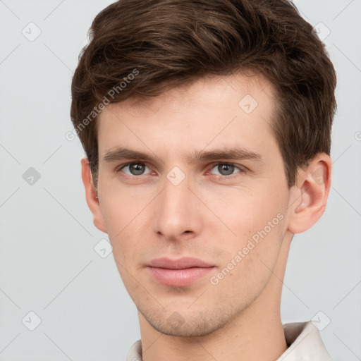 Neutral white young-adult male with short  brown hair and grey eyes