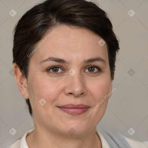 Joyful white adult female with short  brown hair and brown eyes