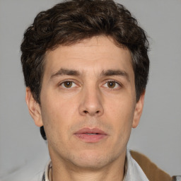 Neutral white adult male with short  brown hair and brown eyes