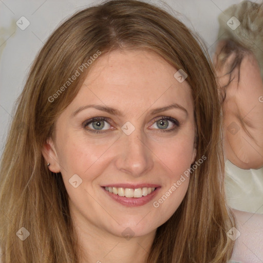 Joyful white young-adult female with long  brown hair and green eyes