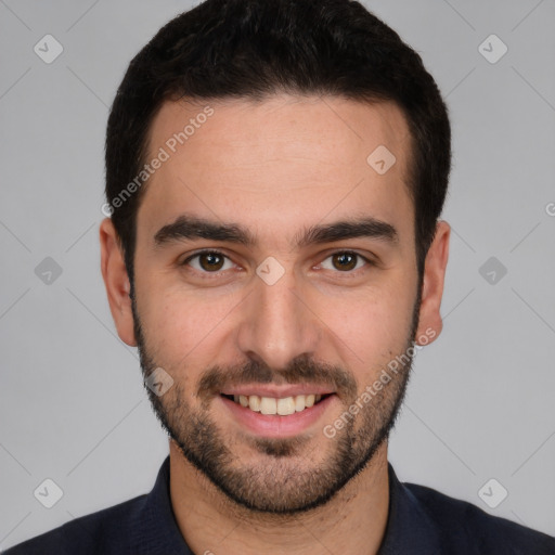 Joyful white young-adult male with short  black hair and brown eyes