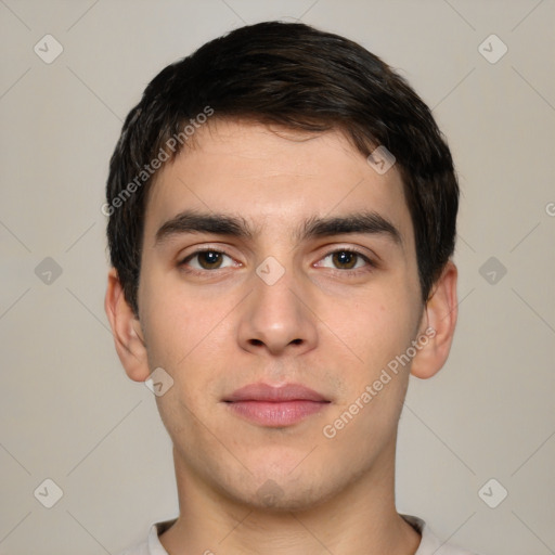 Neutral white young-adult male with short  brown hair and brown eyes