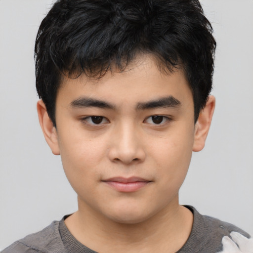 Neutral asian child male with short  black hair and brown eyes