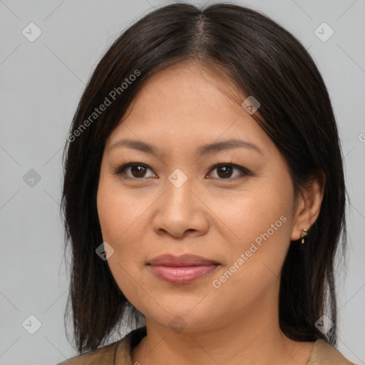 Joyful asian young-adult female with medium  brown hair and brown eyes