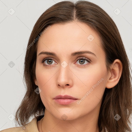 Neutral white young-adult female with long  brown hair and brown eyes