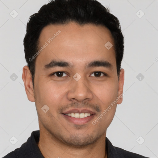 Joyful white young-adult male with short  black hair and brown eyes