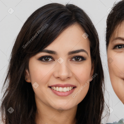 Joyful white young-adult female with long  brown hair and brown eyes